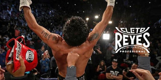 Rękawice bokserskie Cleto Reyes Tradycyjne szkolenie CE4 czarno-srebrne ze sznurowadłami 